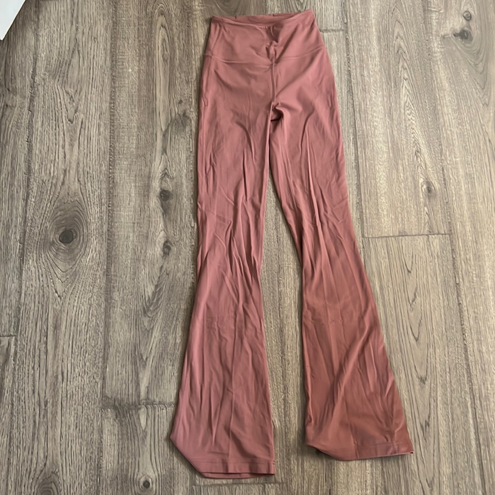 Lululemon nulu groove pants with some damage to the bottom of the legs